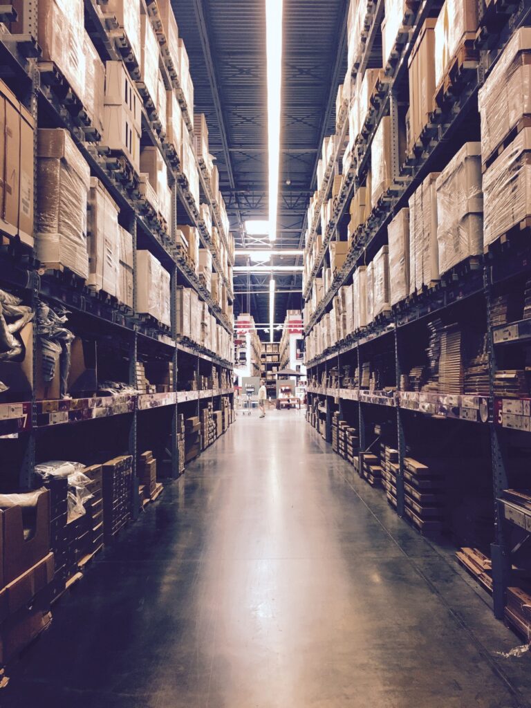 Looking down the aisle of a warehouse store
